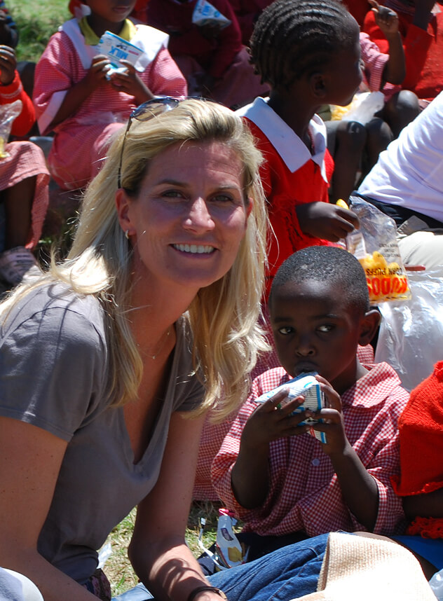 kww-about-kenya Kimberly Wilson Wetty with a child in Kenya