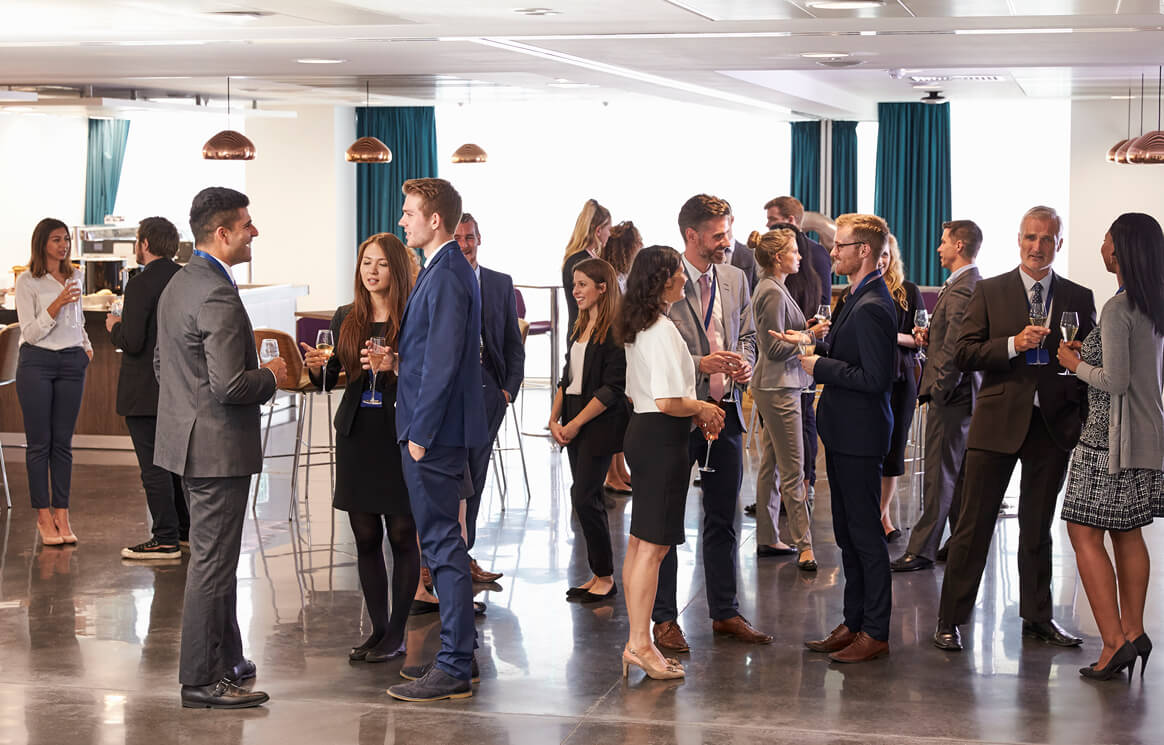 kww-services-designed Group of business people social gathering after seminar business conference.